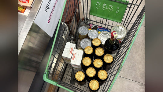 My actual shopping cart filled with groceries at Big C in Phnom Penh during an evening-long hunt for ground beef and cumin